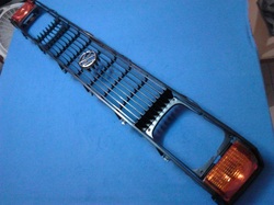 NEW Standard Grille KIT Complete With Turn Signals, Center Emblem & Headlight Bezels to fit US-made Mk1 Rabbit 1981-1984, including Caddy Pickup. Imported.