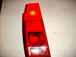NEW OEM Left Side Tail-Light to fit VW Fox Wagon only, 1986-1990.