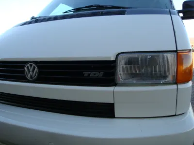 Front of a white VW Eurovan, close-up