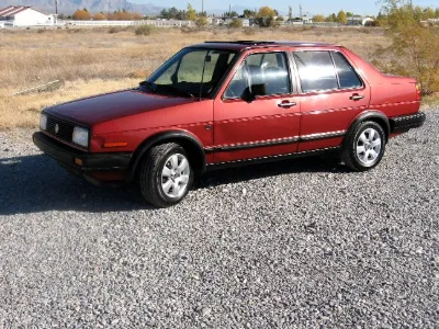 Red VW Jetta, rear view