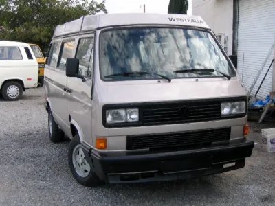 Silver VW Vanagon, front view
