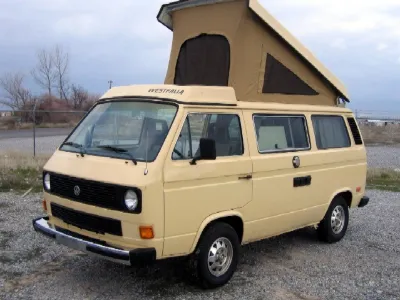 Cream VW Vanagon Westfalia with pop-top raised