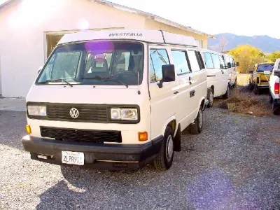 White VW Vanagon, front view